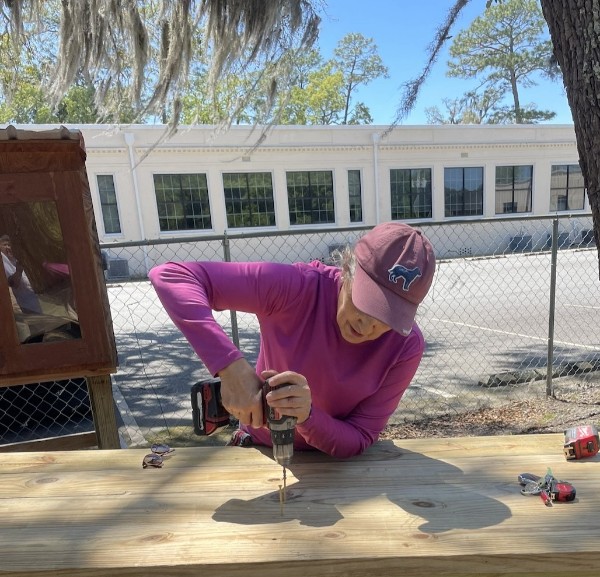 Anabela T. building a potting table